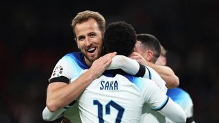 Harry Kane of England (L) celebrates with teammates Bukayo Saka (C) and Phil Foden prior to the Euro 2024 football tournament